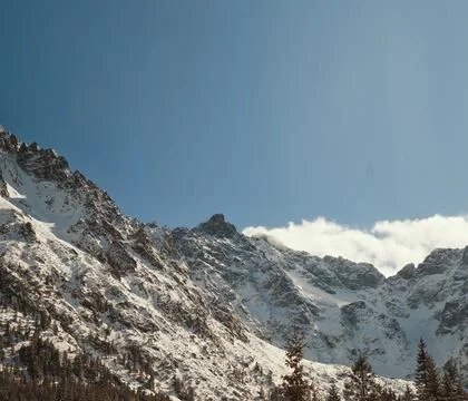 Mountain valley covered with a snow Stock Photos
