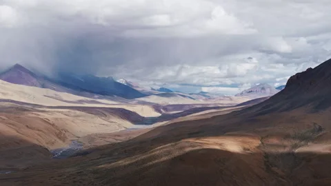 Mountain Valley with Dramatic Light and Shadows Drone View Stock Footage 311049459