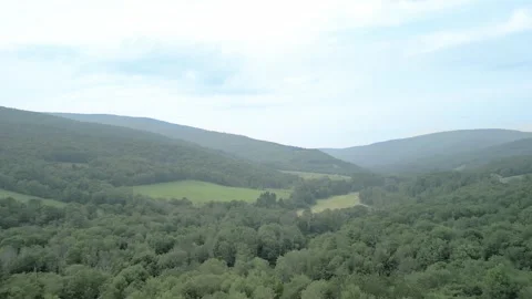 Mountain Valley Drone Aeiral - Looking Down Valley, Flying Backwards Stock Footage 297793949