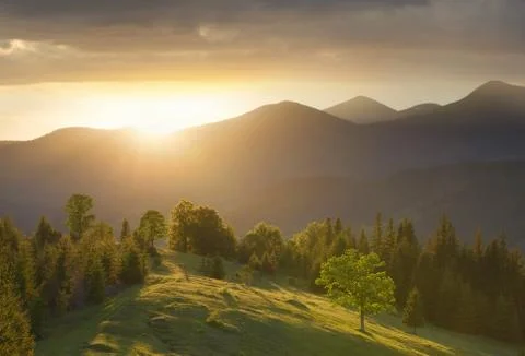 Mountain valley during sundown Stock Photos