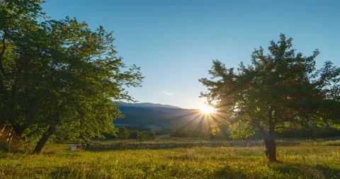 Mountain valley during sunset. Amazing nature scene glowing by sunlight Stock-Footage 221306378