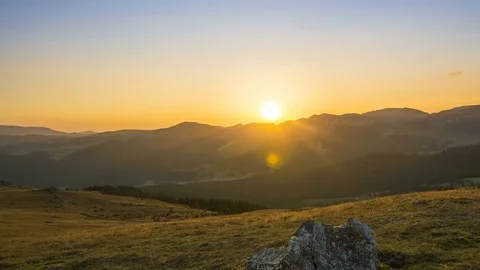 Mountain valley during sunset Stock Footage 79436826