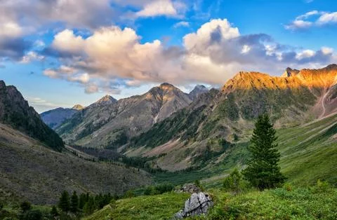 Mountain valley in evening Stock Photos