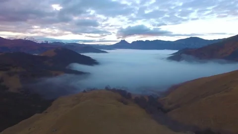 Mountain valley in the fog Stock Footage 148401045