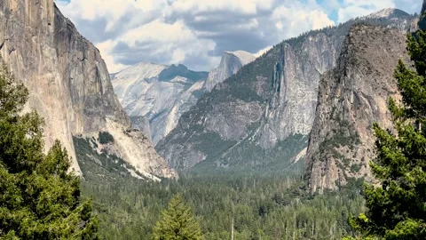 Mountain valley with granite cliffs and pine forest Stock-Footage 348149355