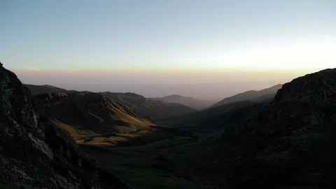 Mountain valley hiding into the darkness sunset Timelapse Stock-Footage 87286080