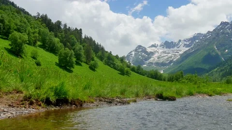 Mountain valley with river and forest in Kavkaz region 스톡 동영상 65773979