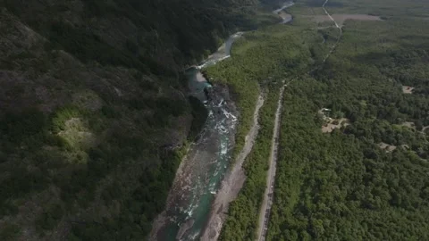 Mountain Valley with River Flowing to Blue Lake Stock Footage 310614056