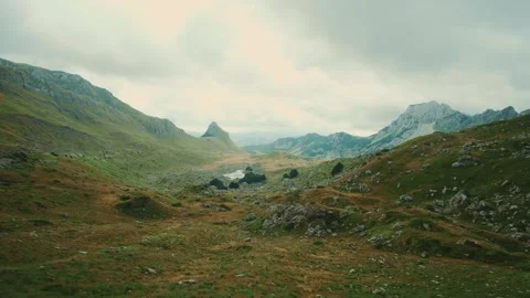 Mountain valley with rolling hills and cloudy sky in Durmitor National Park 스톡 동영상 342800849