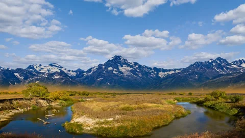 Mountain valley with small river  time lapse scene Stock Footage 159277806