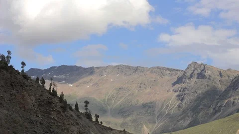 Mountain valley with snow and clouds Stock Footage 95330967