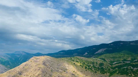 Mountain valley under a dense cloudy sky Stock Footage 346210441