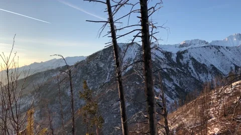 Mountain valley view with forest and airplane in Siberia, winter Stock Footage 122230251