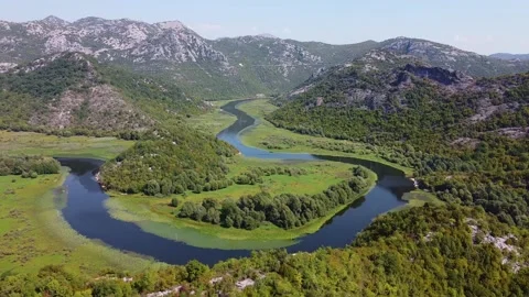 Mountain valley with winding river Stock Footage 167703360