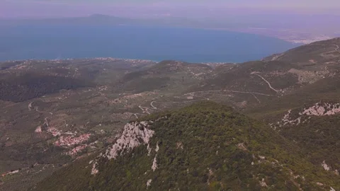 Mountain Valley, Winding Roads and Blue Sea in Peloponnese Stock Footage 337871191