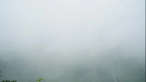 Mountain Valleys Rolling Clouds and Mist Timelapse Stock Footage 321000854