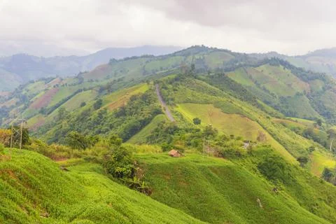 Mountain view along the road with cloud sky at Nan Thailand Stock Photos