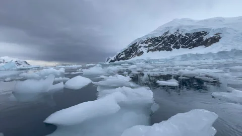 Mountain view in Antartica with reflection in water Stock Footage 237765892