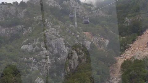 Mountain view from the cabin of the funicular moving up the cable car Stock Footage 279024436