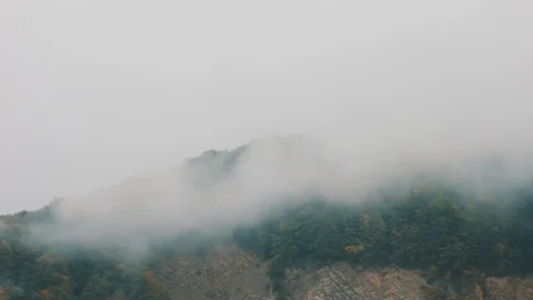 Mountain view in the fog. Weather changes Video stock 120835325