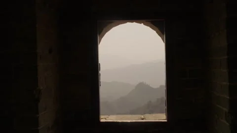 Mountain View Framed by Stone Window Inside Watchtower on Great Wall Stock Footage 345678353