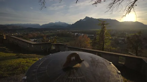 Mountain view from monchsberg hill from pointer or compass at sunset in sunny Stock Footage 230239897