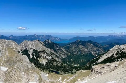 Mountain view over valley with blue sky, Soiernspitz,,Chiemsee, Bavaria, Germany Stock Photos