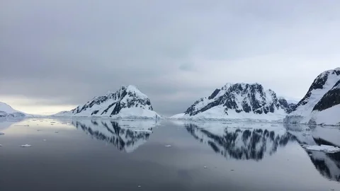 Mountain view from ship at sunset in Antarctica Stock Footage 107810917
