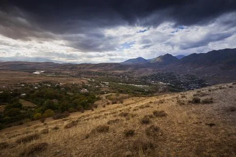 Mountain view at sunset autumn, dramatic sky Stock Photos