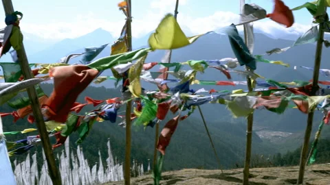 Mountain view through prayer flags, panning shot Stock Footage 265235043