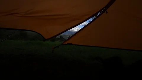 Mountain view through tent fly zipper flapping in the wind Stock Footage 123403494