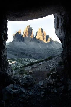 Mountain view to tre cime out of a cave Stock Photos