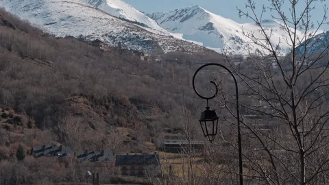 A mountain view with a vintage lantern captivates the eye and soul with its Stock Footage 303705795