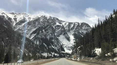 Mountain view while driving on the interstate Stock Photos