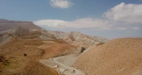 Mountain view in zagros range in iran with blue sky and clouds road and Stock Footage 125958540