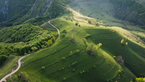 Mountain views with green hills, during spring. Aerial view of Dumesti village f Stock Footage 155007380