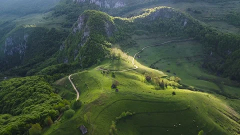 Mountain views with green hills, during spring. Aerial view of Dumesti village f Stock Footage 155007403