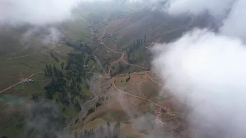 Mountain village view clouds above in summer Stock Footage 243698221