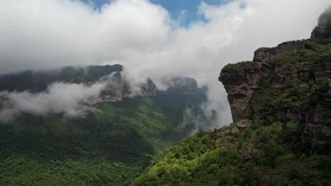Mountain Vista with Rolling Clouds and Lush Green Forest Landscape Видео 332727196