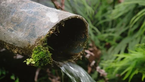 Mountain Water Coming From A Pipe Stock Footage 235667066