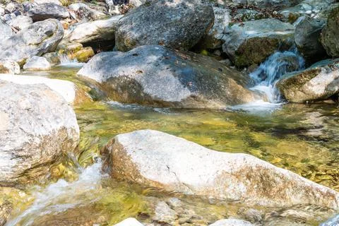 Mountain water course Stock Photos