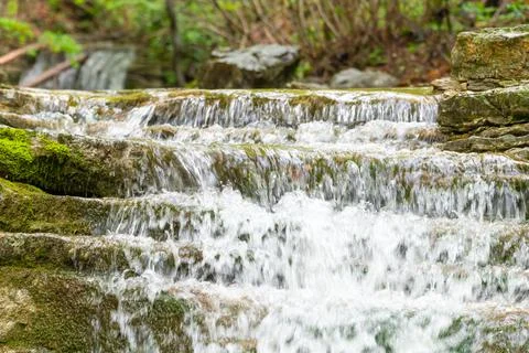 Mountain water course Stock Photos