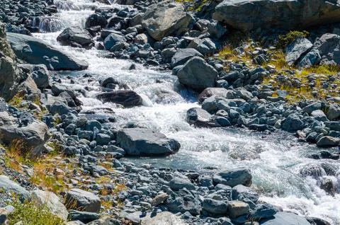Mountain water course Stock Photos
