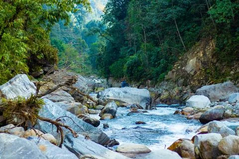 A mountain water fall come though the rocks Stock Photos