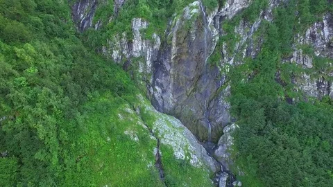 Mountain waterfall from above Stock Footage 70319679