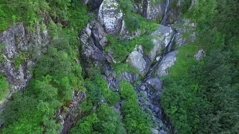 Mountain waterfall from above Stock Footage 70319960