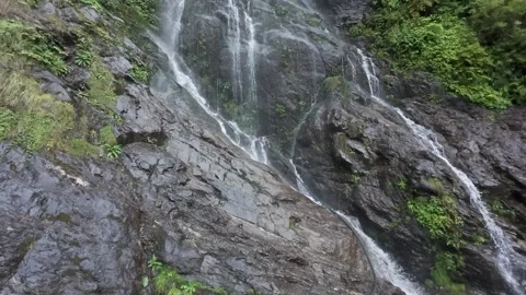 Mountain Waterfall Cascading Over Wet Dark Rocks on the Kedarnath Trekking Path Stock Footage 325014788