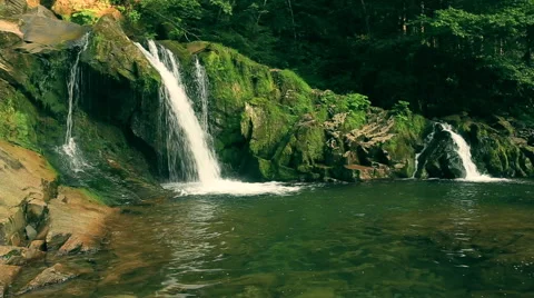 Mountain waterfall. Distant Stock Footage 52930393