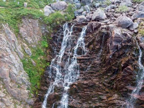 Mountain Waterfall with Drone Stock Photos