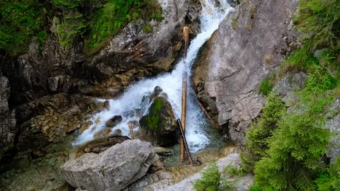 Mountain waterfall flowing on the rocks 스톡 동영상 112895205